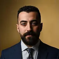 ‎Andre Laham‎